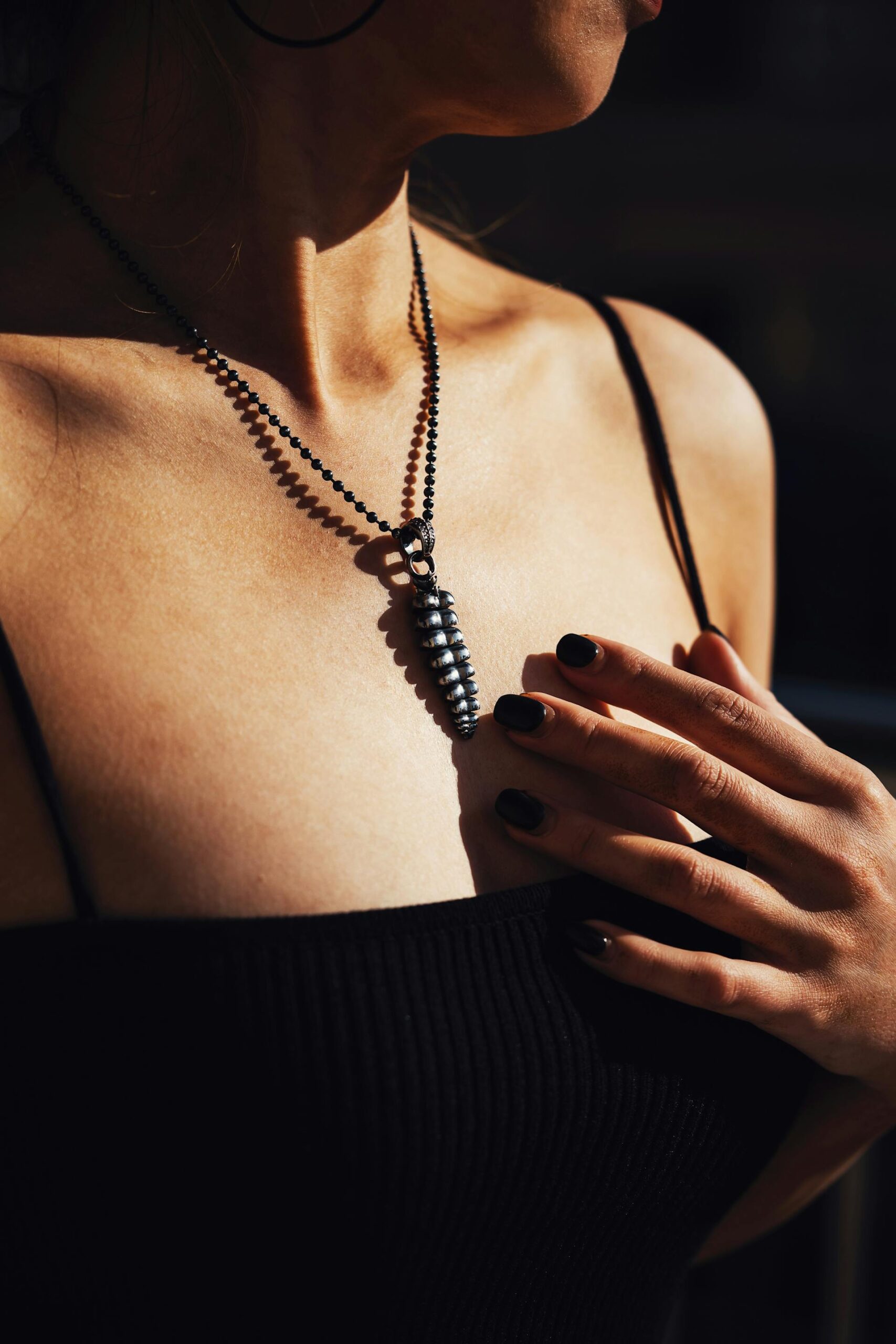 pendant on a model's neck
